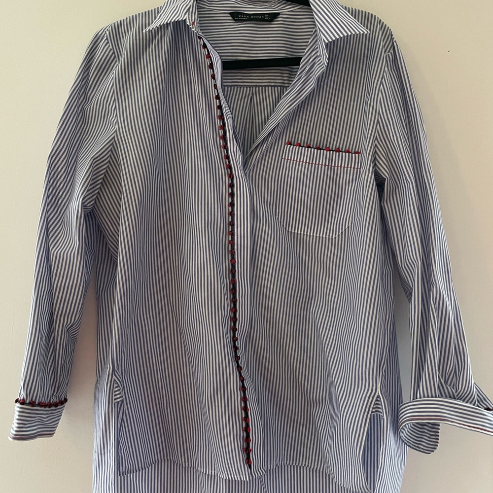 Zara. Blue stripped button down, with red trimming. Worn only a few times.